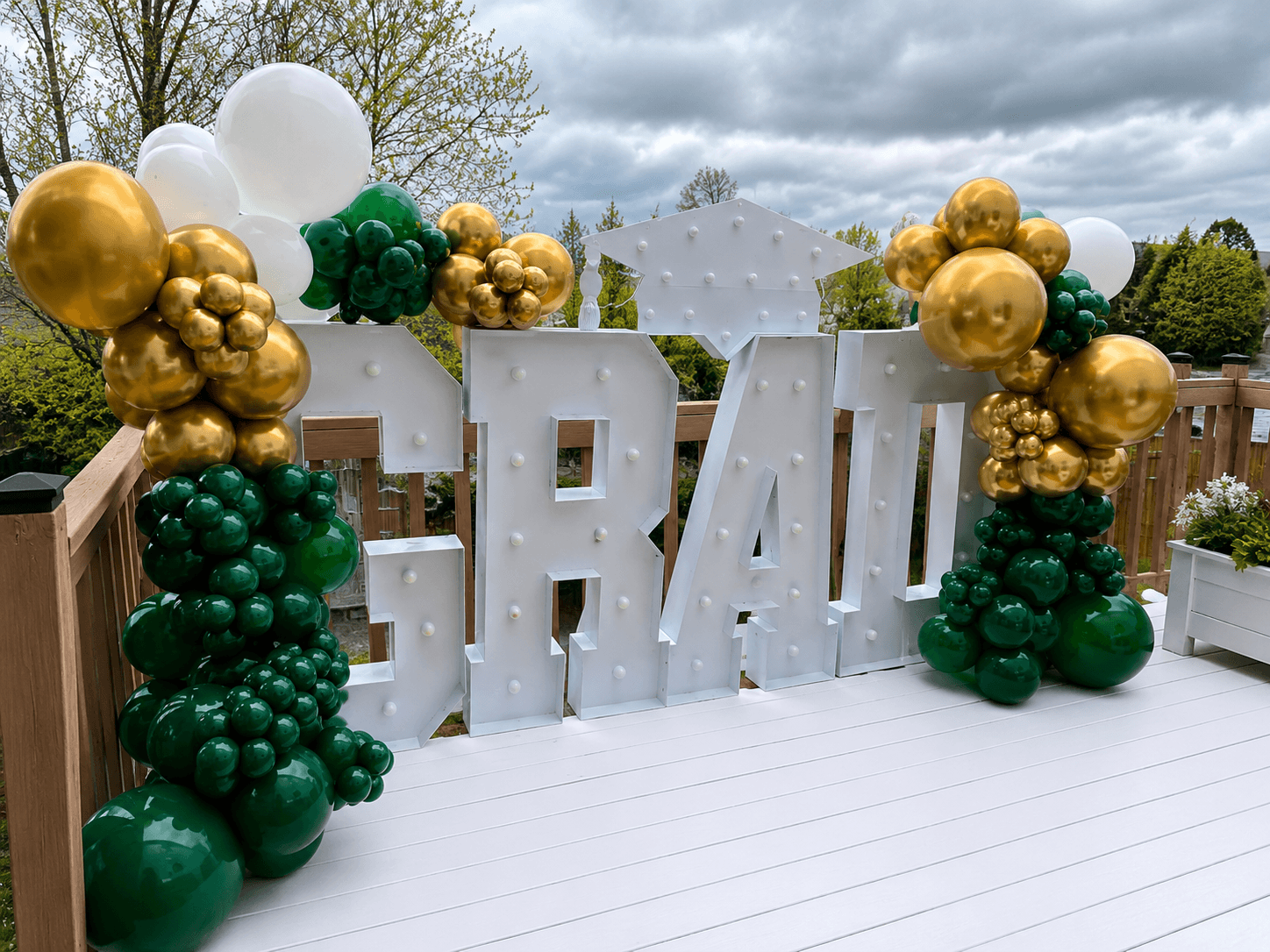 Finished balloon backdrop delivered and set up, ready for the celebration to begin